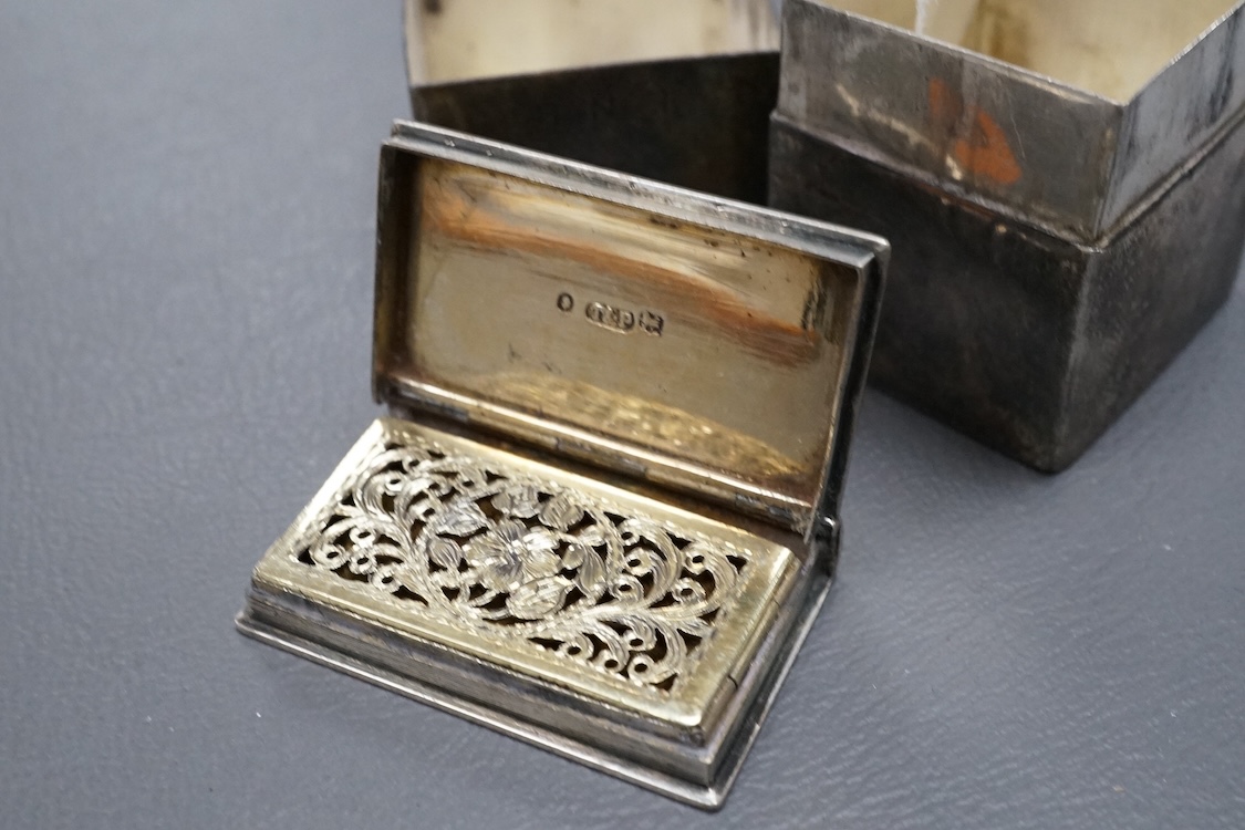 A William IV silver 'book' vinaigrette by Taylor & Perry, Birmingham, 1835, 40mm, together with a white metal box and cover.